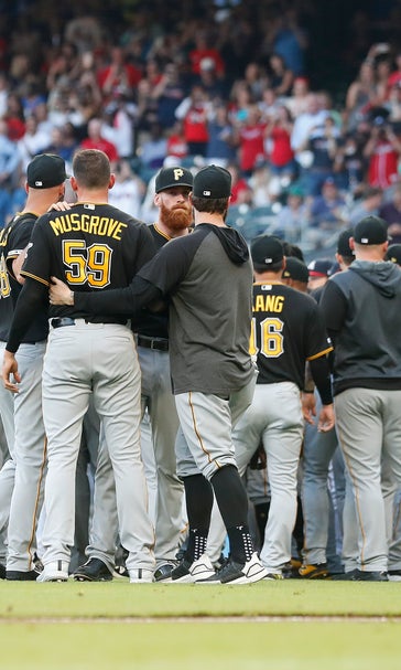 Acuña hits grand slam after early fracas, Braves top Pirates